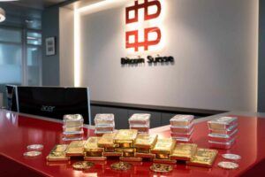 Edelmetalle vor dem Bitcoin Suisse Logo