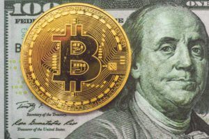 Bitcoin und 100-Dollar-Note