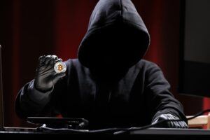 Hacker mit Bitcoin