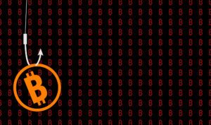 Bitcoin am Haken als Symbol für einen versuchten Hacking-Angriff auf Wallets